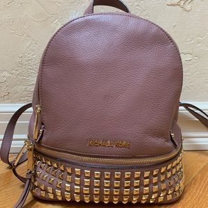 Michael Kors gold studded backpack in dusty rose